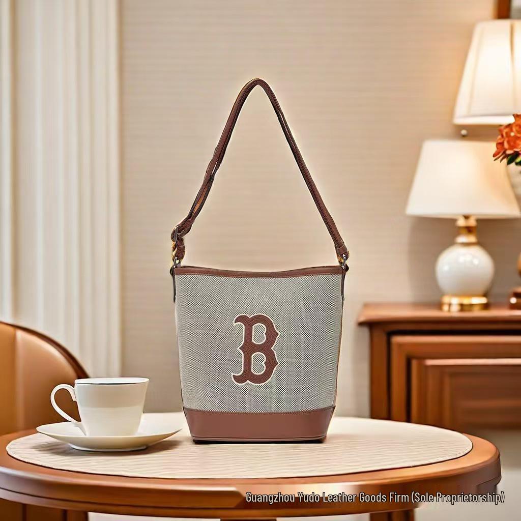 

Korea MLB Monogram Canvas Bucket Bag – Unisex Summer Crossbody/Shoulder Handbag 18*13*23.5 коричневий