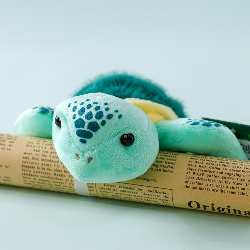 The new cute palm treasure, the little yellow duck doll doll, the car ornament accompanies the doll and gives children gifts.