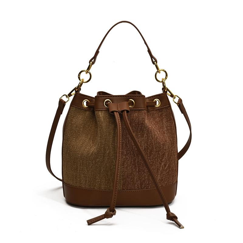 

New denim splicing shoulder bucket bag fashionable commuter large capacity oblique span bag fashionable bucket handbag women