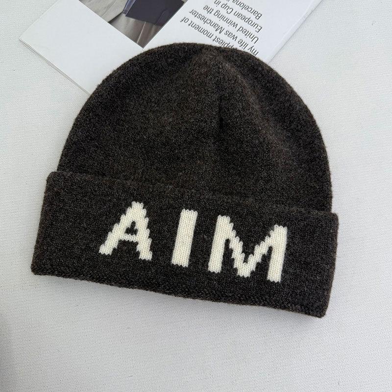 Niche personalized letter knitted hat children's autumn and winter new wool hat warm ear protector bag head cold hat