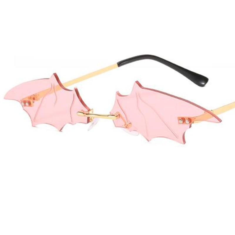 

Fashion Rimless Sun Glasses Personality Bat Anti-UV Spectacles Funny Eyeglasses Google Women Rimless Sunglasses as picture розовый