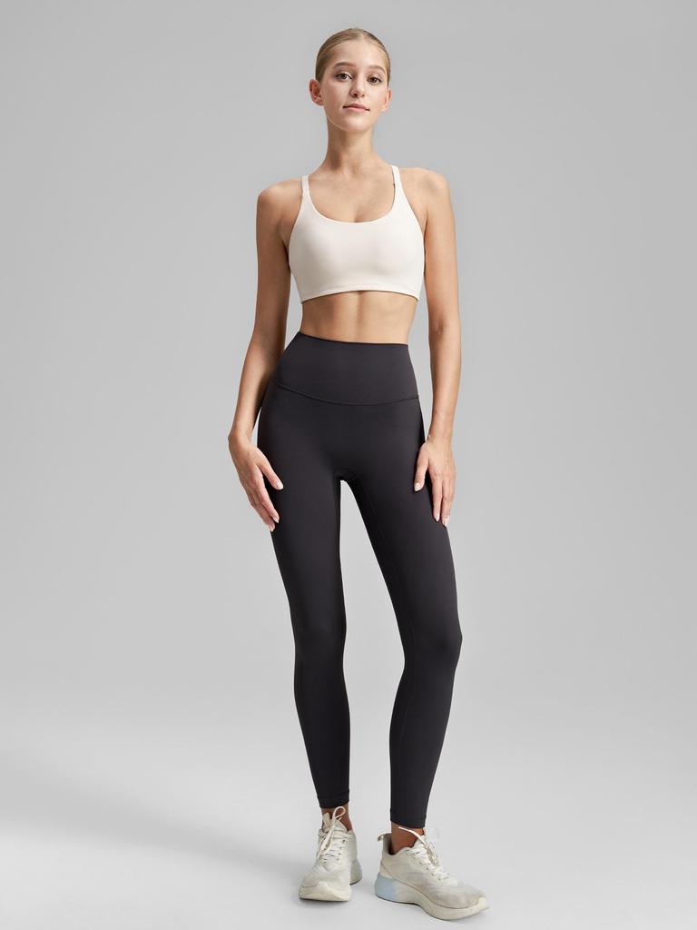 Women's Cross-Back Sports Bra: Sexy, Stylish Design for Pilates, Fitness, and Yoga, with Fixed Cups and Thin Straps for Outdoor Wear.