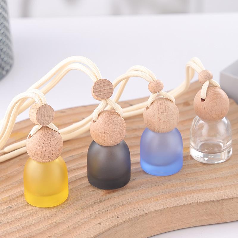 Frosted Glass Car Diffuser Bottle with Lanyard for Essential Oils - Refillable and Ideal for Home or Wardrobe Decor.
