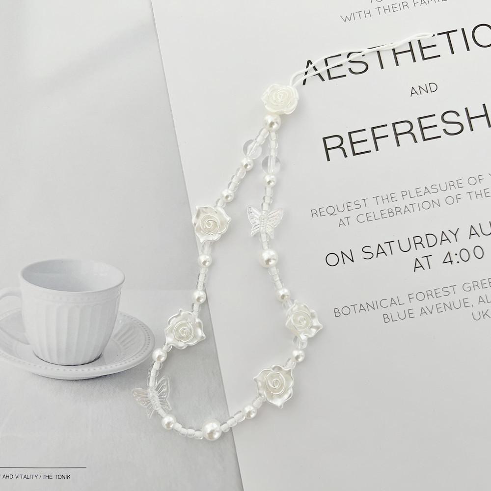 Bracelet de perles d'amour pour femmes, petit nœud en cristal frais, fleurs, amour, chaîne de téléphone portable, anti-chute, accessoires de coque de téléphone portable, DIY