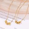 Korean Style 18K Gold Plated Titanium Steel Clavicle Necklace – Versatile, Colorfast, Thin Chain with Small Gold Bean and Coin Pendants.