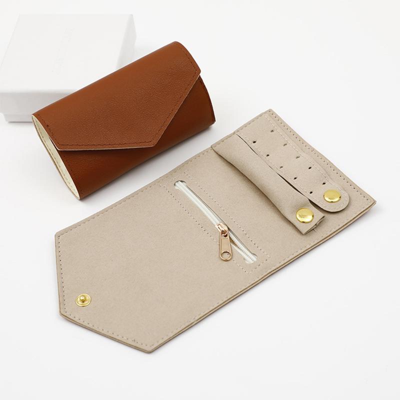 

Портативный для путешествий Серьги Кольца Ожерелья Броши Складная сумка для хранения Мини-ролл для ювелирных изделий Органайзер для ювелирных изделий для путешествий 1pc коричневый