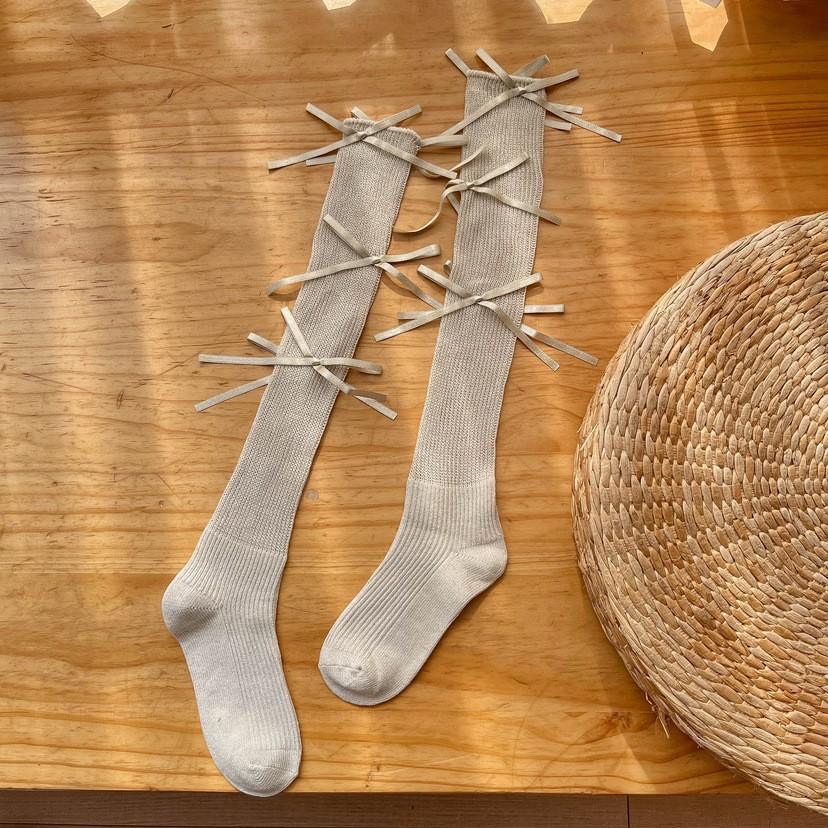 

2024 Japanese And Korean Silver Onion Stacking Socks Pure Desire Wind Bow Calf Socks Versatile Medium And High Tube Sweet Girl Socks One size брудно-білий