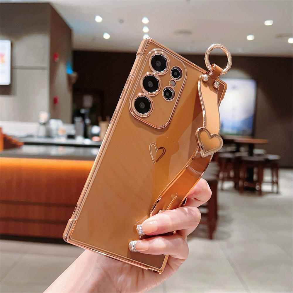 

For Samsung Galaxy S24 Ultra Case Electroplated Heart Pattern TPU Phone Back Cover with Wristband Kickstand Brown