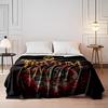 A Swirling Skeletal Design with Horns, Scythe, and Blood-like Accents. for All Seasons Blanket Lunch Break Throw Gift