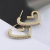 Trendy Love-Shaped Cubic Zirconia Stud Earrings – Stylish & Unique Design with High-End Appeal
