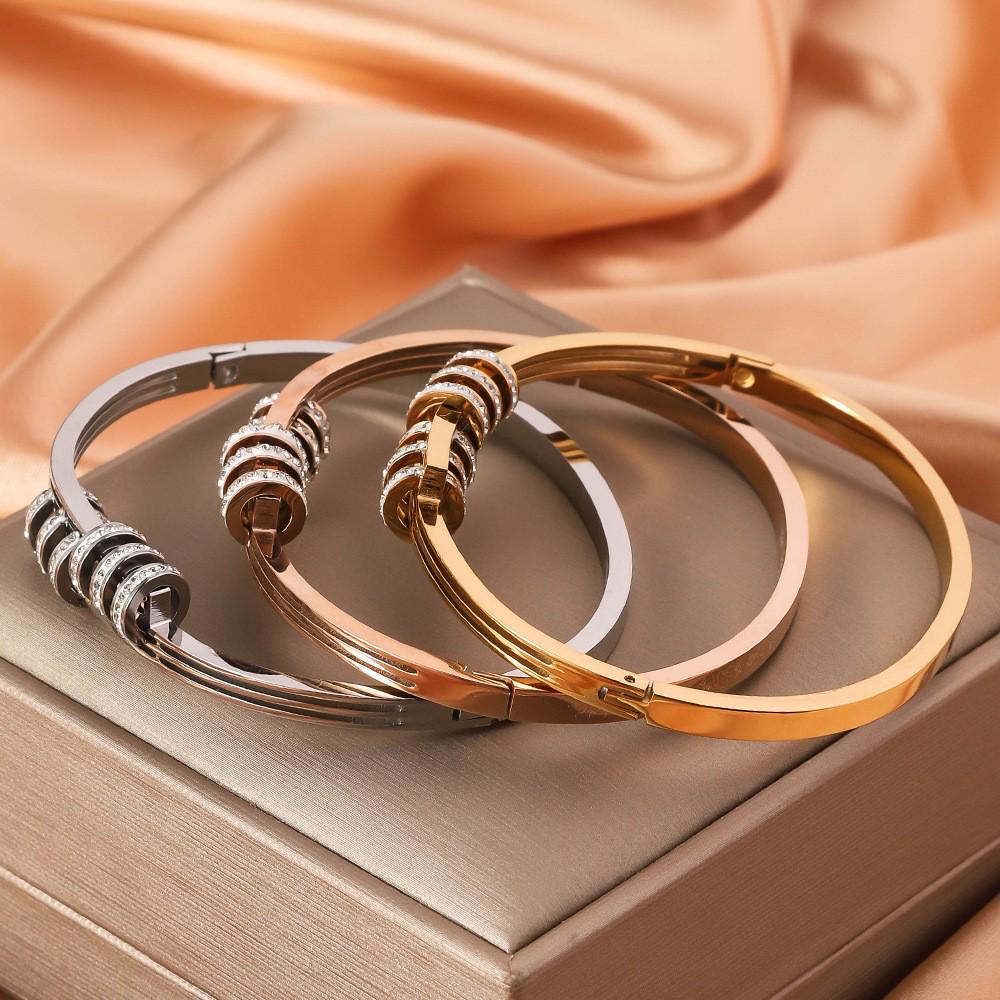 Women's Titanium Steel Luxury Bracelet with Hollow Design and Inlaid Round Diamonds