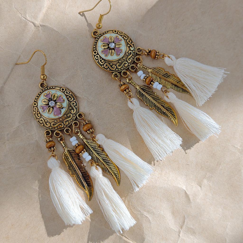 Retro ethnic style woven feathers long fringed earrings, bohemian high-end hollow rice bead earrings