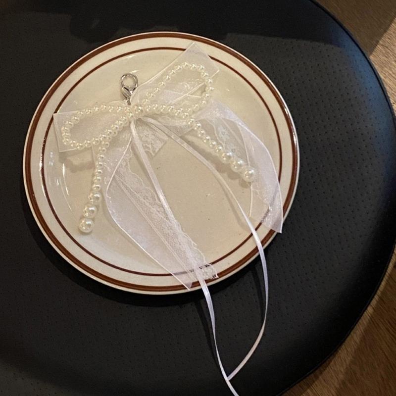 Eleganter Schlüsselanhänger mit Perlen, Handyanhänger, einzigartiger Schlüsselanhänger, Schleife, Taschenanhänger, Accessoire für Geldbörse und Rucksack