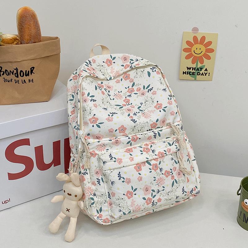 Schoolbag floral Mori schoolbag female Korean version junior high school student large capacity backpack versatile college student versatile travel