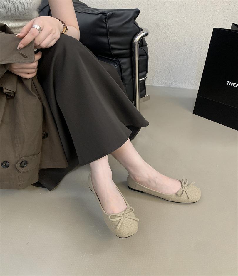 Gentle and cute flat-soled ballet shoes women's shoes 2025 spring evening breeze temperament red with skirt shallow mouth single shoes