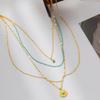 Turquoise Titanium Steel Necklace: Four-Layer Chain with Irregular Round Tag Pendant