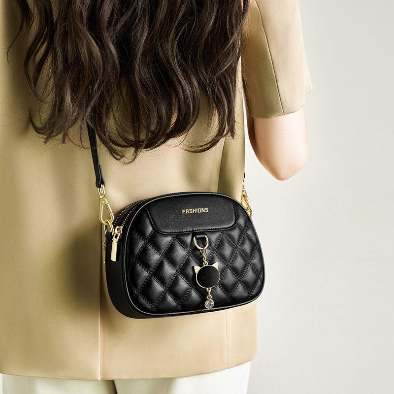 Traveling bag women's explosive high-end shoulder messenger bag Xiaoxiangfeng solid color diamond bag versatile women's bag