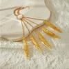 Hollow golden bracelet chain connected to a hollow flower ring, ladies' connected finger bracelet back accessory.