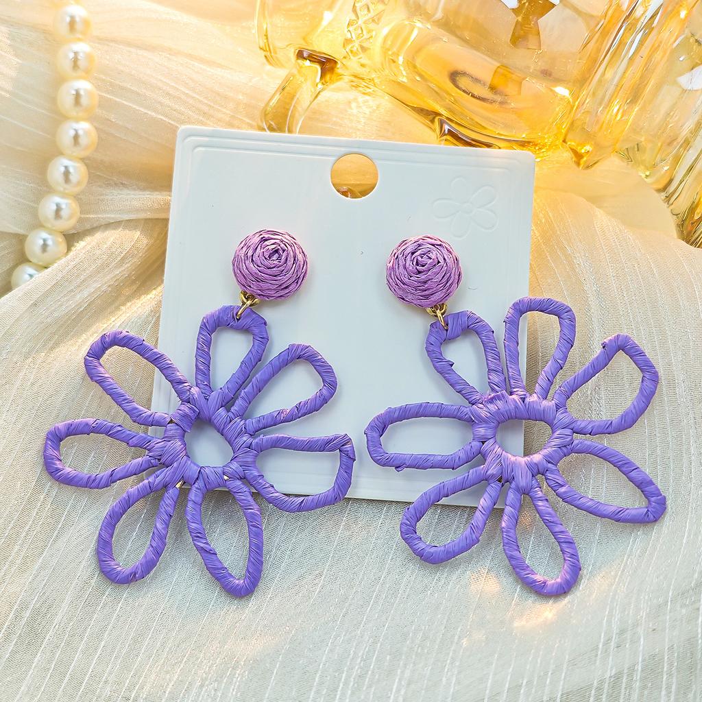 European and American cross-border summer vacation style earrings women, personalized color hand-woven raffia hollow flower earrings