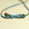 Adjustable Pendant Necklace with Handmade Woven Cord, Featuring Jadeite, Amber, Nanhong, and Hetian Jade Stones.