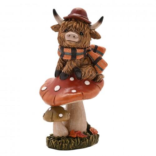 Country Living Highland Cow on Mushroom