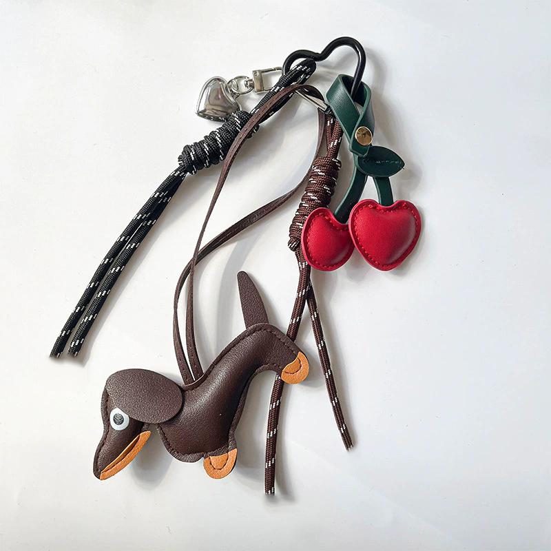 

Ланцюжки для сум з таксами Жіночі прикраси для сумок Підвіски для сумок Аксесуари для сумок Модні сумки Мотузки Ремінець-підвіска для сум кавовий