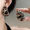 Silver needle leather leopard print wrapped round stud earrings Hong Kong-style millennial personalized earrings light luxury high-end earrings