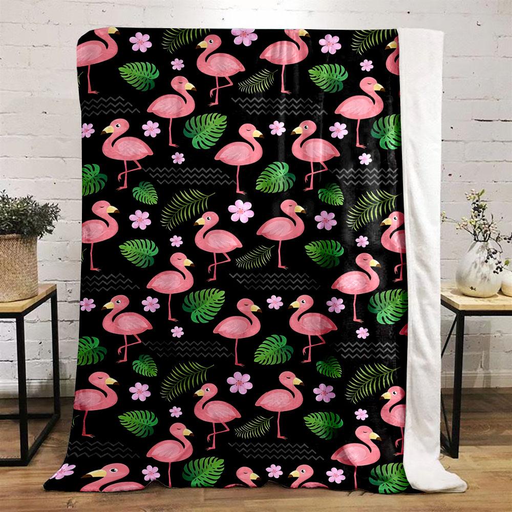 Pink Flamingos and Tropical Leaves Pattern Patterned flannel blanket perfect for the bedroom living room, sofa, or a little nap