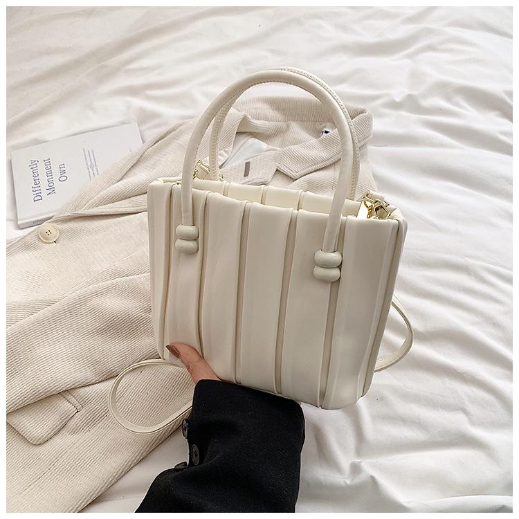 Korean version ins solid color pleated handbag bag women's 2025 autumn new foreign style casual one shoulder messenger tote bag