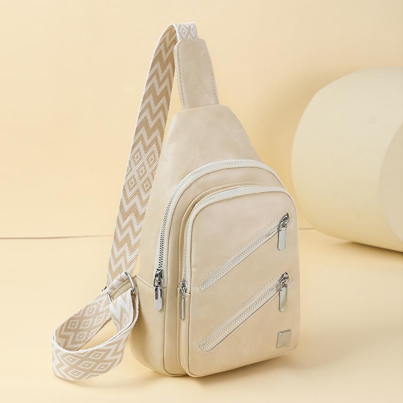 New fashionable and versatile women's breast bag, mobile phone bag, shoulder bag, large-capacity travel and leisure oblique span bag.