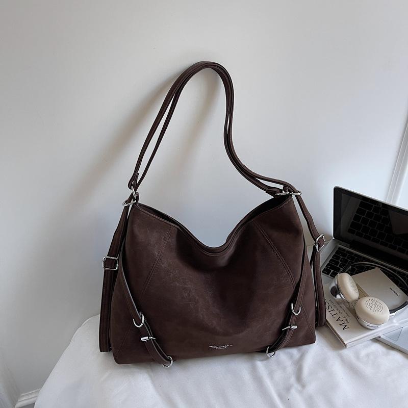 

Suede backpack bag women s 2025 autumn new lazy and slack feeling large capacity commuting high value messenger bag темно-коричневого