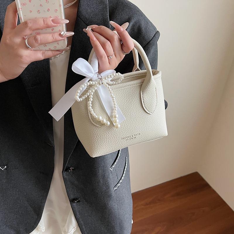 Niche design portable bucket bag women's 2025 new spring and summer bag shoulder messenger bag tide