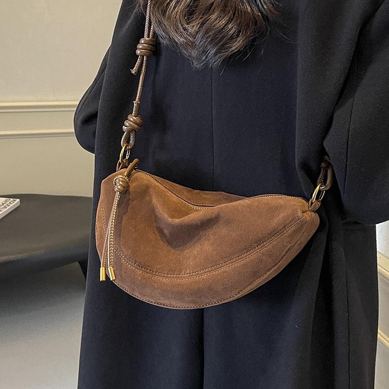 Superbeliebte Nischen-Wildleder-Schultertasche aus Kunstwildleder für Damen 2025 Heißer Verkauf Einzelne Umhängetaschen Unterarm-Knödel Süße Taschen sac