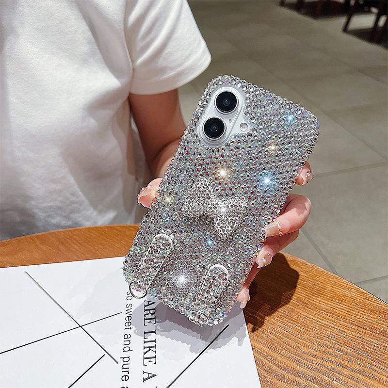 Premium flash diamond bow lanyard mobile phone case is suitable for Apple 17Promax women's Iphone16 protective case.