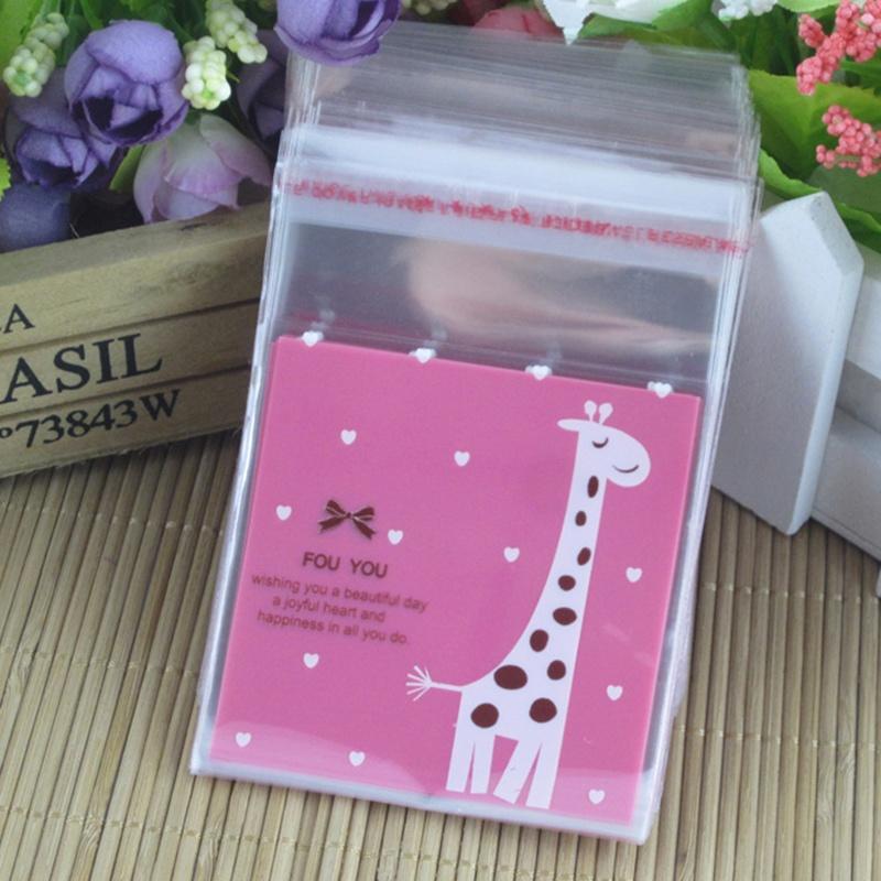 100 Pcs/set Self Adhesive Christmas Santa Cellophane Party Treat Cooky Candy Gift Bags