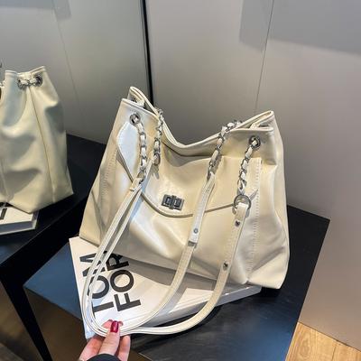 Gestructureerde grote capaciteit eenvoudige schoudertas dames nieuwe casual eenvoudige forenzen tote bag modieuze onderarmtas