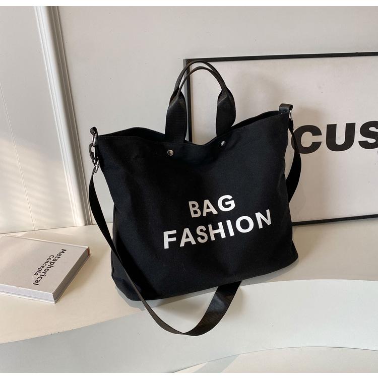 

Female student large-capacity tote bag to work Japanese commuter tote bag portable new shoulder messenger bag чорний