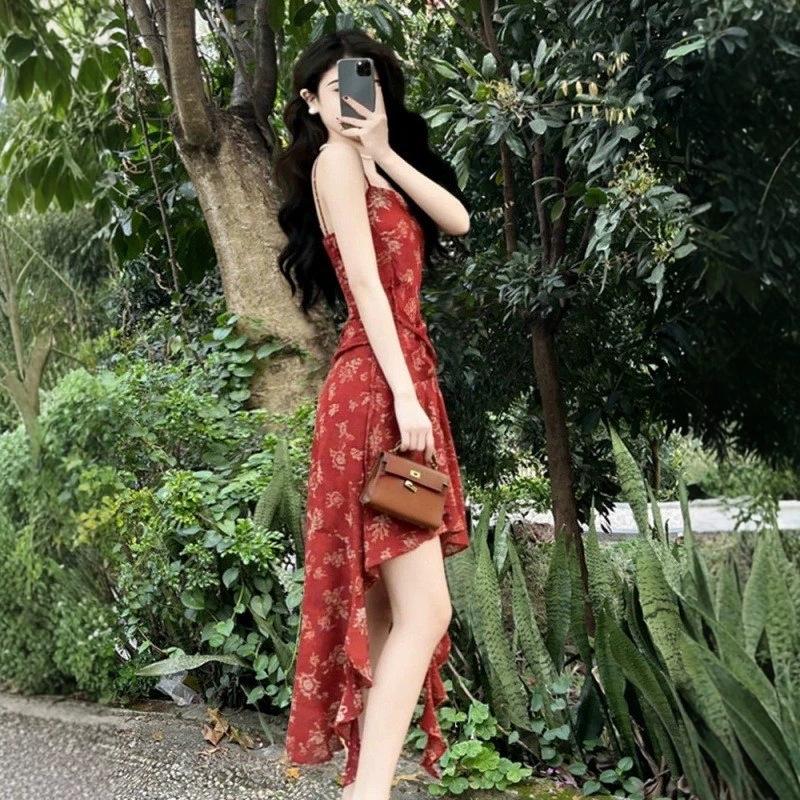 Red floral suspender dress women's new design sense ruffle leaf edge irregular waist smudge suspender skirt