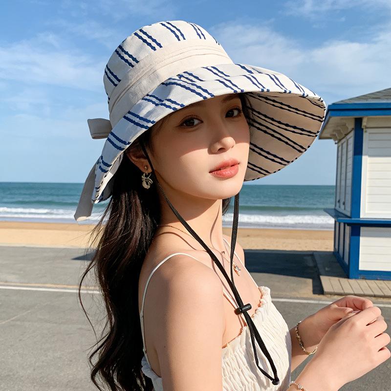 Taizhou Wenling summer sunscreen hat women's outdoor big eaves sunshade bucket hat big head circumference show face small sun hat