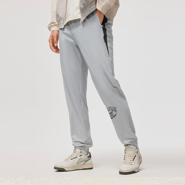 Li Ning Basketball Series Spliced Letter Mid-Rise Tapered Knit Sports Pants Men bottoms Mist-Gray AYKU389-1