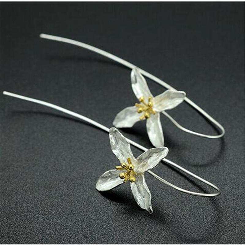 

Этнические серьги-гвоздики с позолотой в виде цветов – Экстравагантные