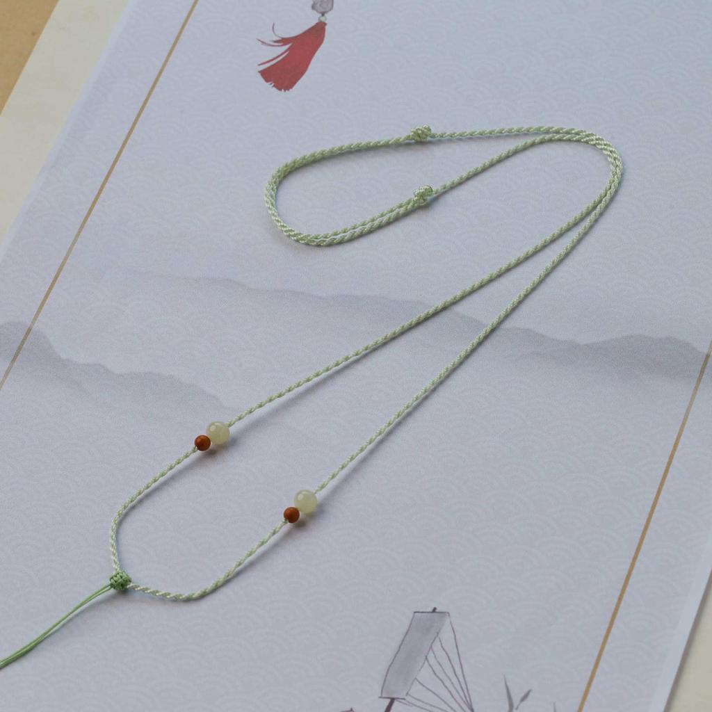 High-End Unisex Peace Buckle Jade Pendant Necklace with Red Rope, Ultra-Thin Style