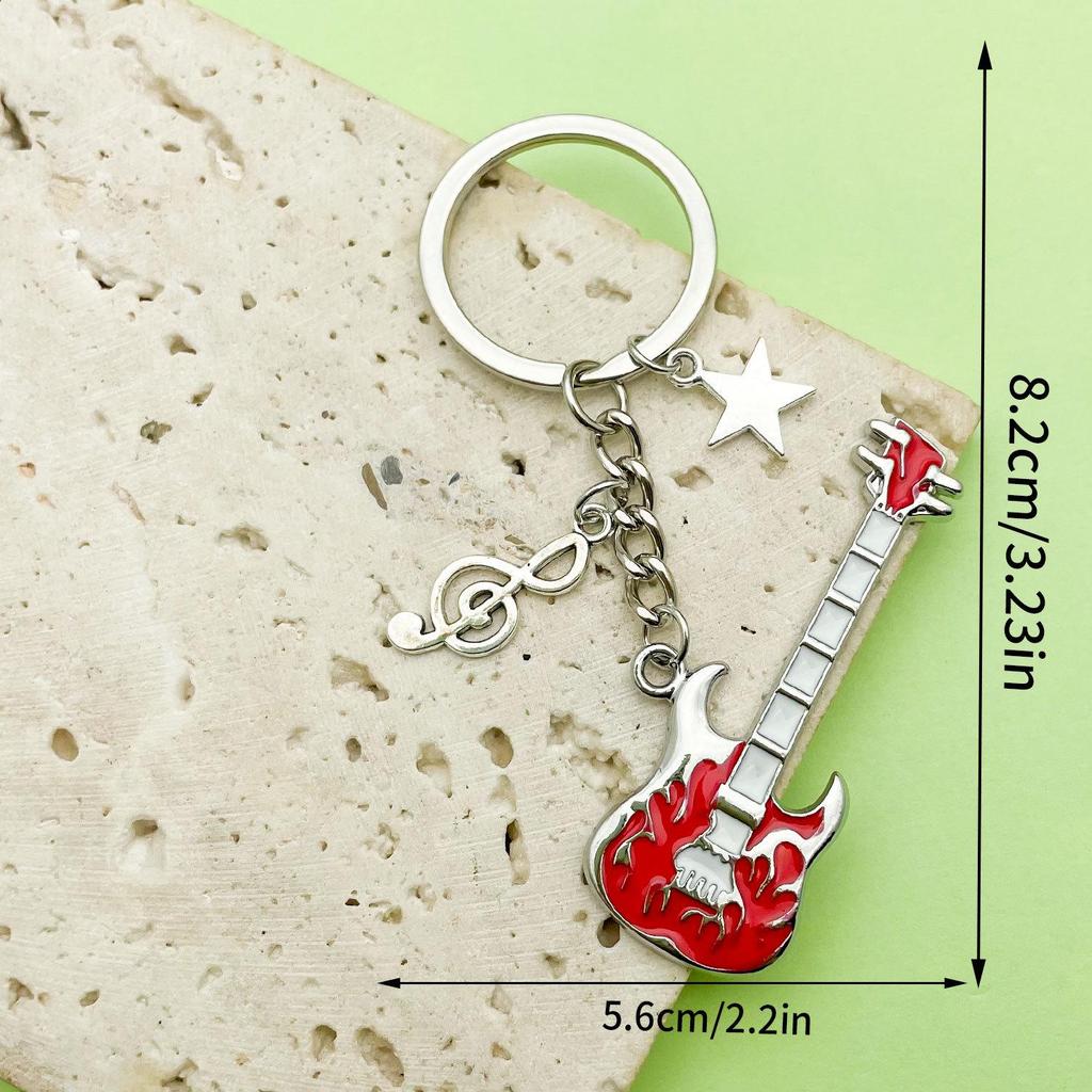 Antique Silver Music Cassette & Saxophone Keychain with Creative Design
