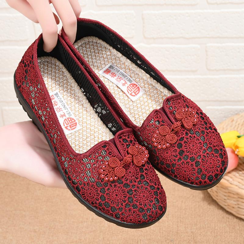 Summer new cloth shoes women's flying woven hollow breathable medium and old soft sole one pedal casual shoes