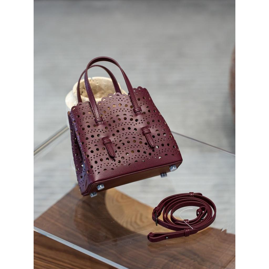 Velkoobchodní továrna prémiová niche vyřezávaná dutá taška na zeleninu Mina kožená dámská taška přes rameno crossbody tote taška