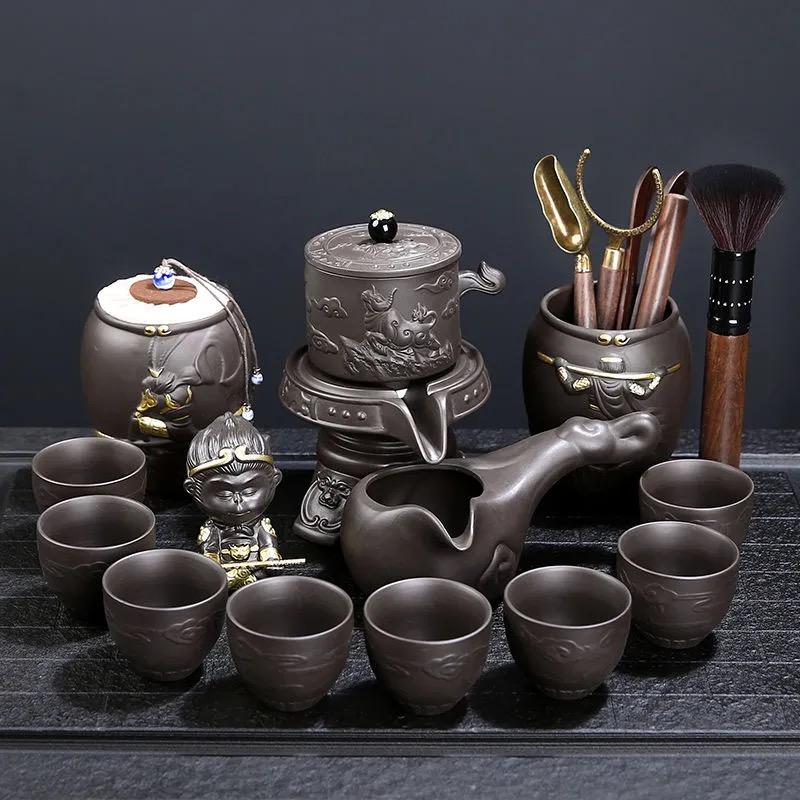 Purple Clay Stone Grinding Semi-automatic Tea Set Creative Kung Fu Tea Hot Sales of Tea Set.Creative
