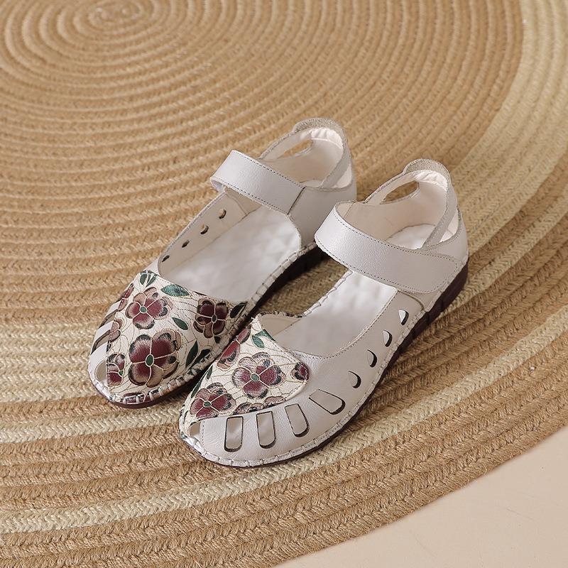 Summer new leather hollow sandals women's flower embroidery flat bottom soft sole mother shoes Velcro shallow mouth