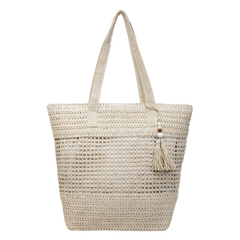 Woven Straw Tote with Tassel Accent and Spacious Interior for Summer Beach or Casual Daily Use