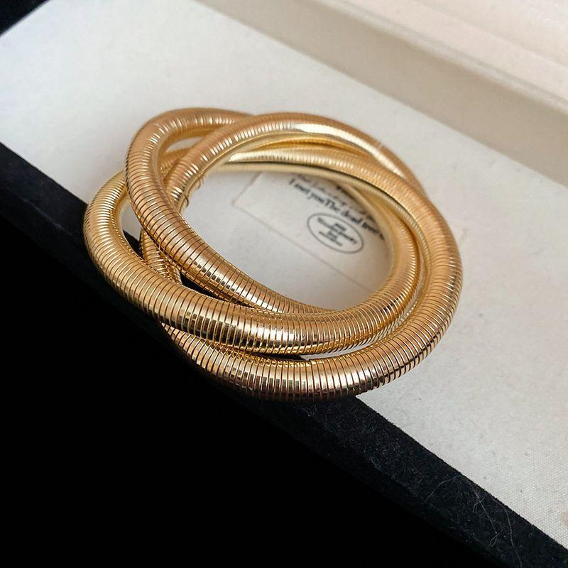 

European and American Metal Winding Thread Vortex Bracelet European and American Personality Cold Wind Bracelet Light Luxury High Sense Hand Jewelry Bracelet - Gold