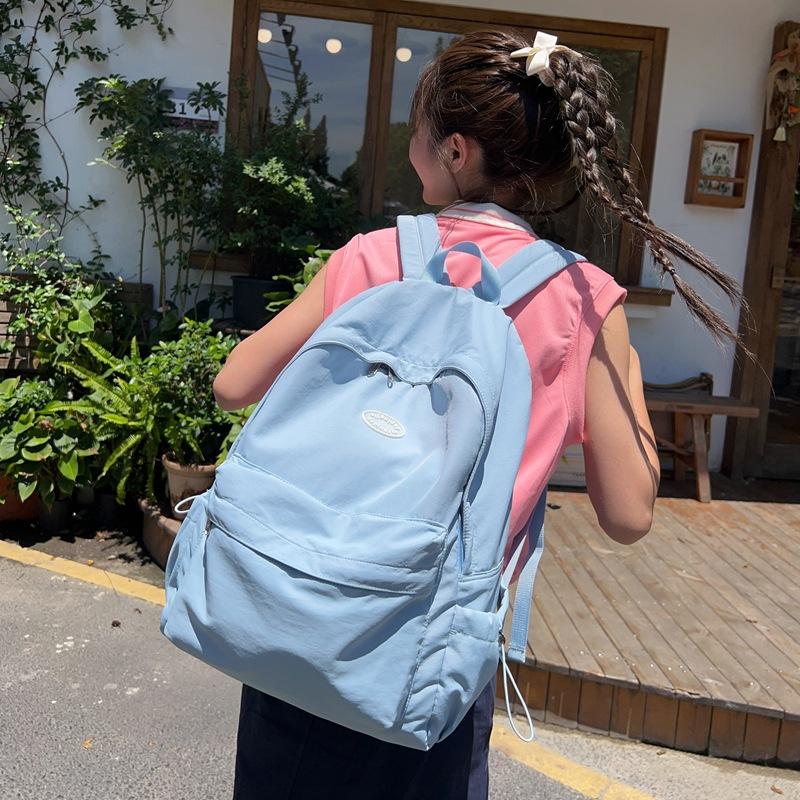 Ensfarget ryggsekk kvinnelig student skolesekk i nylon
